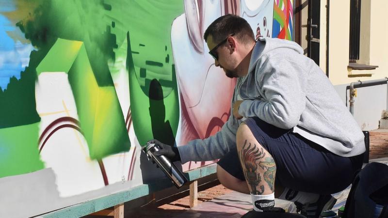 Világszerte elismert graffitiművészek újraértelmezték egyedülálló történelmi esemény üzenetét – nézd meg a videót és a galériát!